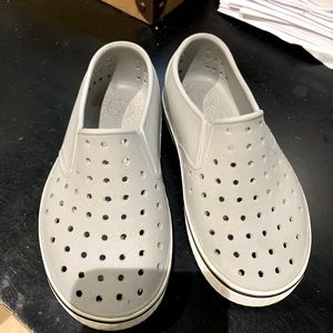 Size 12 kids Native water sneakers.